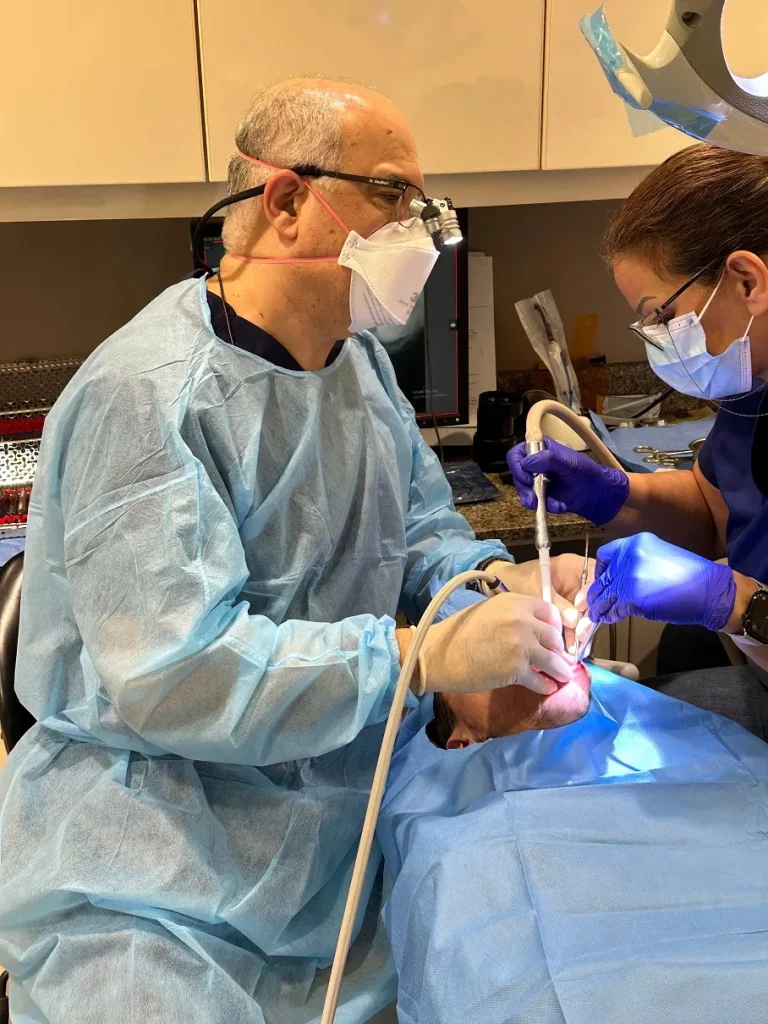 Patient receiving aftercare instructions following oral surgery at our North York clinic