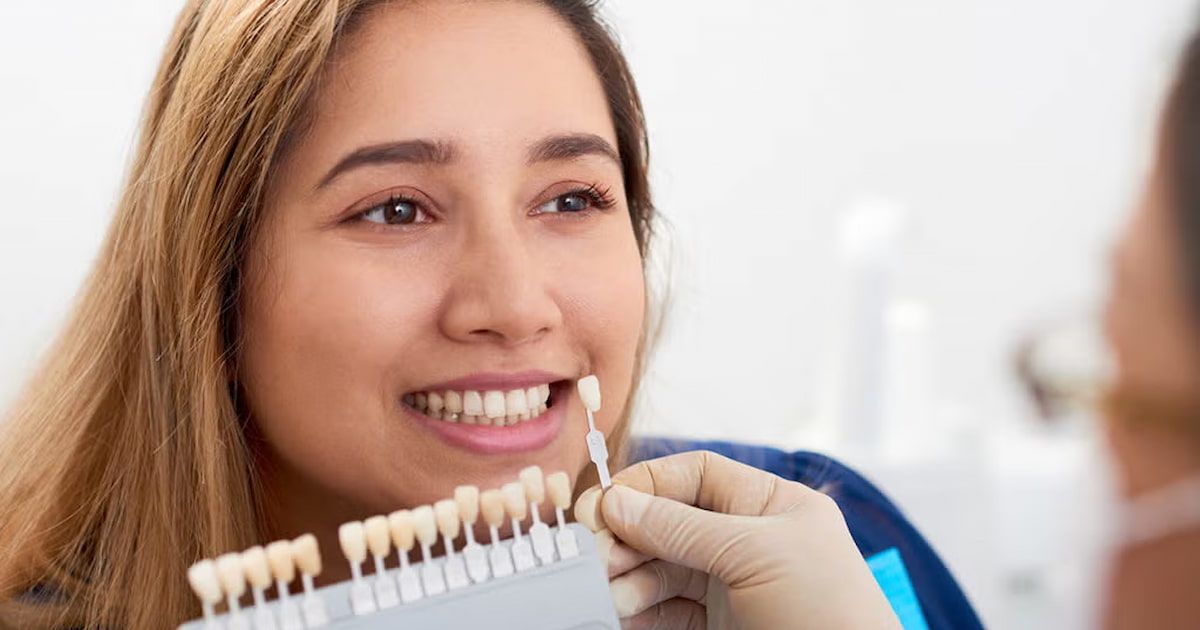 a photo of a lady choosing the best dental veneer type to avoid veneer failure