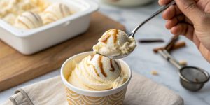 a photo of ice cream in a bowl to show what tooth sensitivity to cold is and answer the question why do my teeth hurt when I eat ice cream